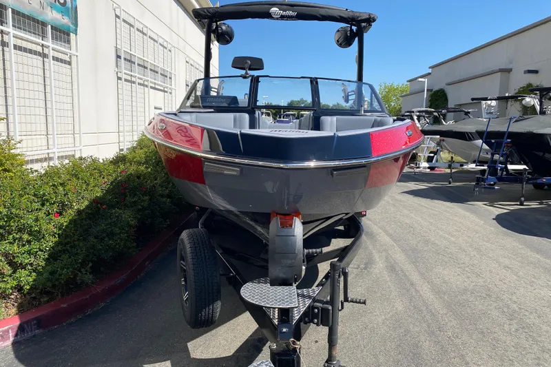 Slide: The Image of 2025 Malibu Wakesetter 23 LSV boat on trailer, displayed outdoors. - 5