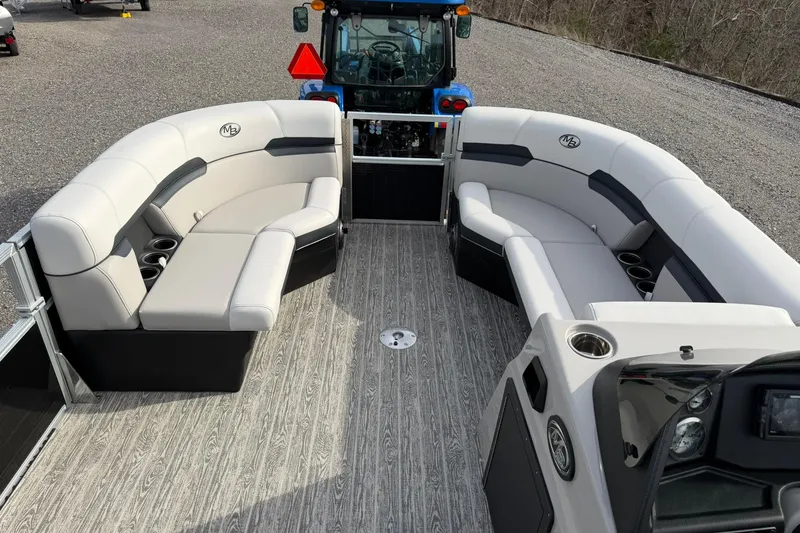 Slide: The Image of Luxurious 2026 Montego Bay 140HP pontoon boat interior with plush seating and modern design. - 12