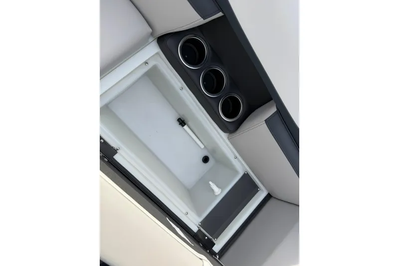 Slide: The Image of Interior view of 2026 Montego Bay 140HP boat with cup holders and storage compartment. - 13