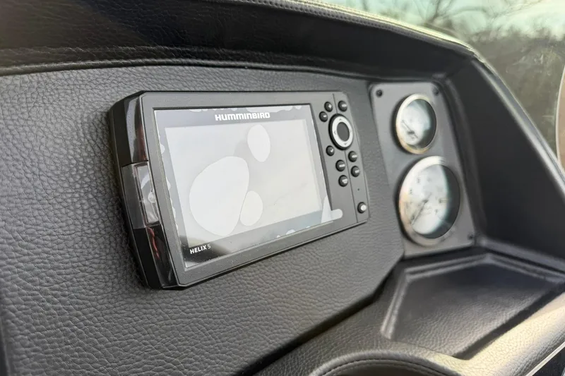 Slide: The Image of Dashboard of 2026 Montego Bay 140HP with Humminbird Helix 5 fish finder. - 16