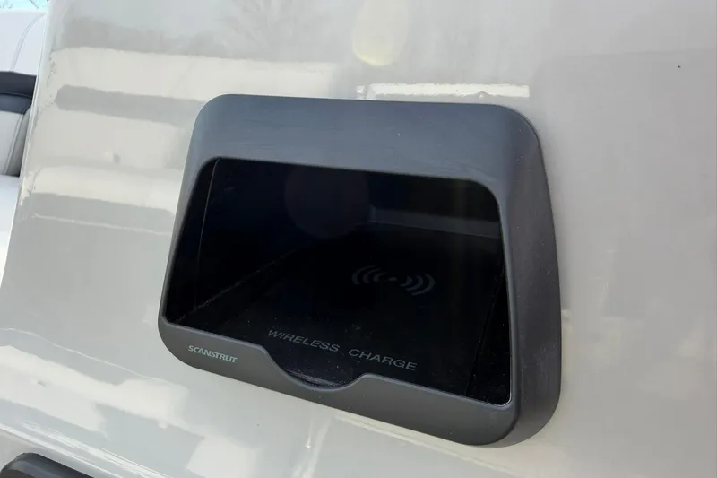 Slide: The Image of Wireless charging station on a 2026 Montego Bay 140HP boat. - 18