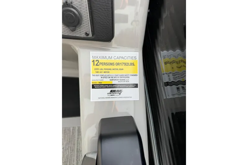 Slide: The Image of 2026 Montego Bay 140HP boat capacity label, max 12 persons or 1792 lbs. - 21
