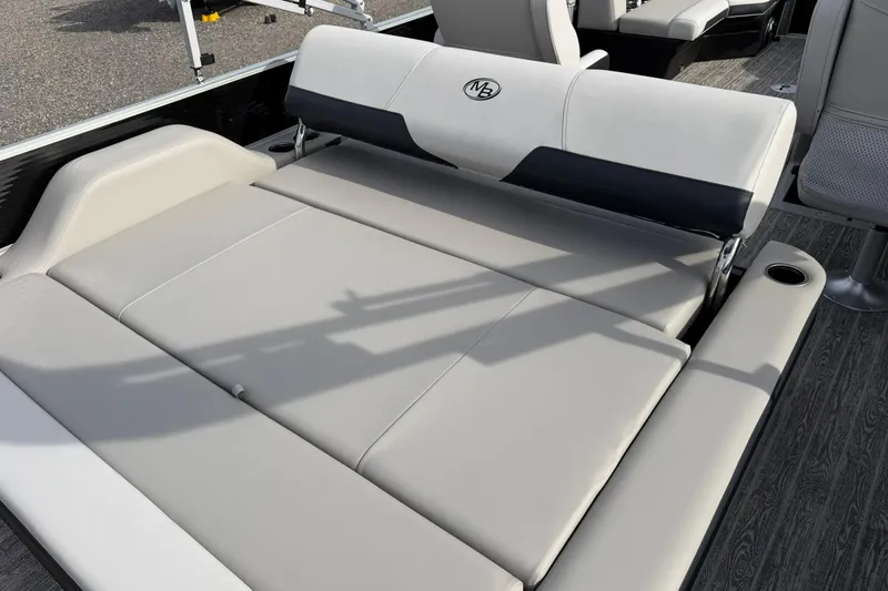 Slide: The Image of 2026 Montego Bay 140HP boat interior with luxurious seating and modern design. - 24