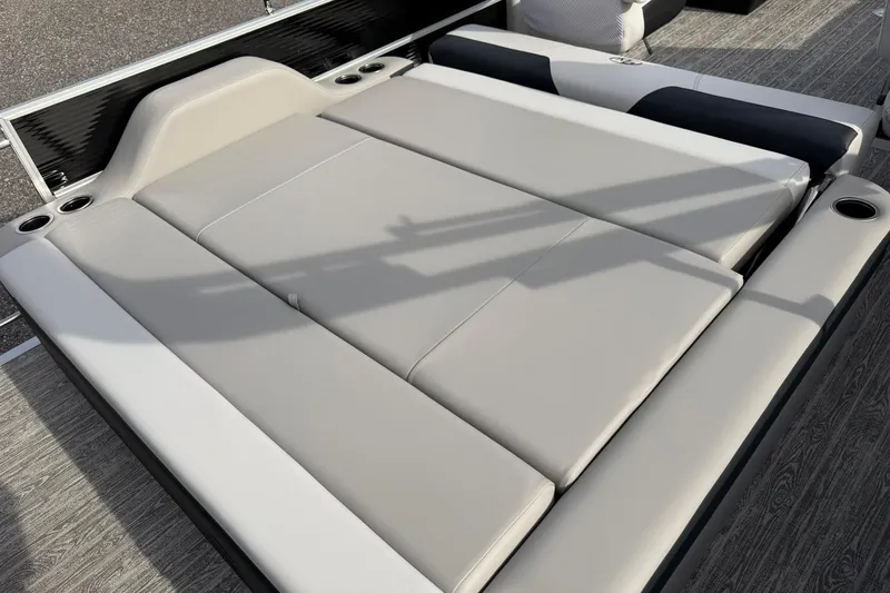Slide: The Image of Luxurious seating on 2026 Montego Bay 140HP boat, featuring comfortable cushions and cup holders. - 25