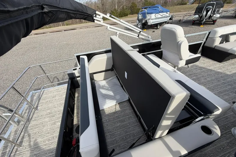Slide: The Image of 2026 Montego Bay 140HP pontoon boat interior with adjustable seating and modern design. - 26
