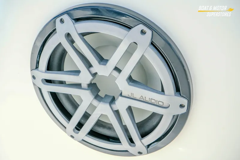Slide: The Image of JL Audio speaker on 2016 Pursuit C 260 Center Console boat. - 13