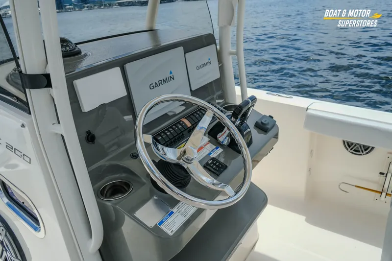 Slide: The Image of 2016 Pursuit C 260 Center Console boat helm with Garmin navigation system. - 14