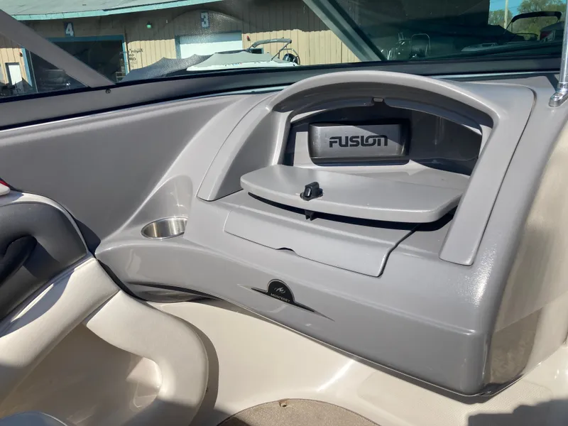 Slide: The Image of Interior of a 2012 Monterey 204FS boat with Fusion audio system. - 13