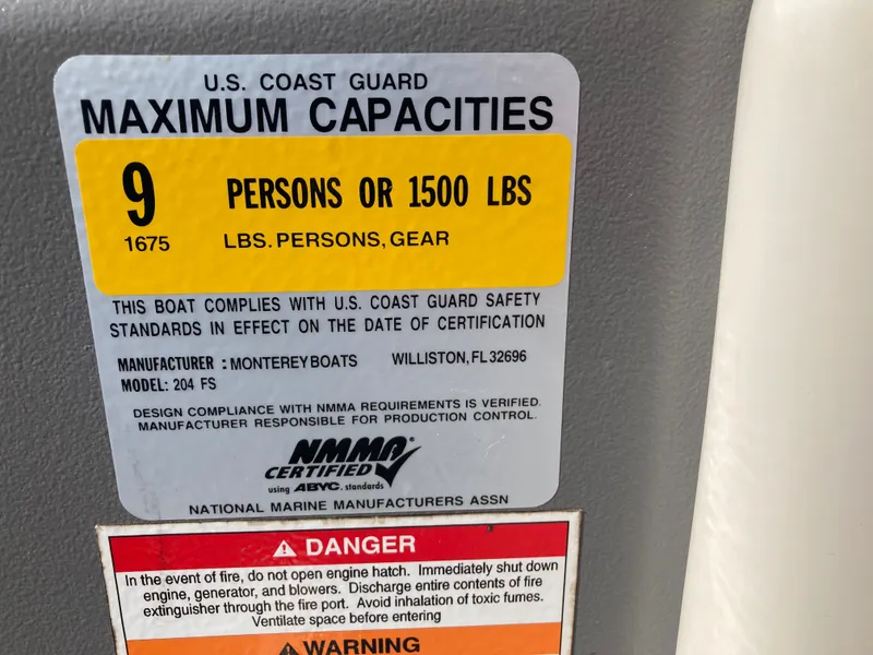 Slide: The Image of US Coast Guard capacity label for Monterey 204FS boat, 9 persons or 1500 lbs. - 18