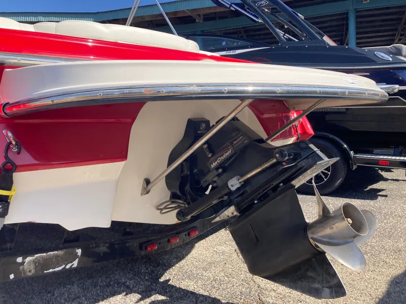 Slide: The Image of Red 2012 Monterey 204FS boat with MerCruiser drive. - 2