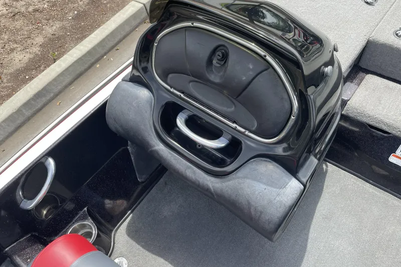 Slide: The Image of 2013 Nitro Z-8 boat interior with storage compartment and seating area. - 15