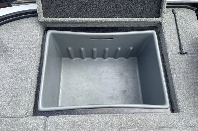 Slide: The Image of Open storage compartment in 2013 Nitro Z-8 boat, featuring a spacious interior. - 18