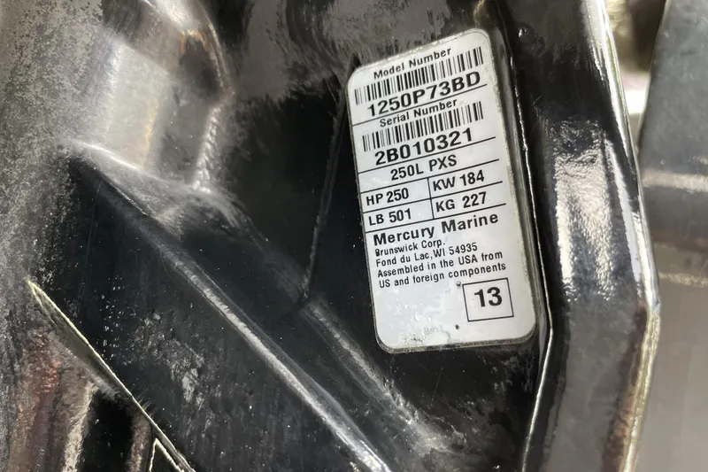 Slide: The Image of Label on Mercury Marine engine, model 250L PXS, 250 HP, assembled in USA. - 24