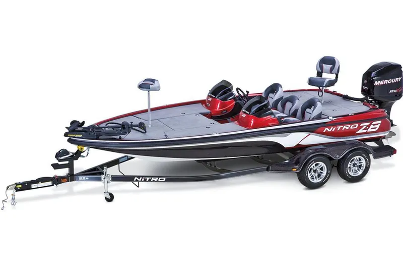 Slide: The Image of Manufacturer Provided Image: 2013 Nitro Z-8 bass boat with trailer, featuring sleek design and Mercury outboard motor. - 35