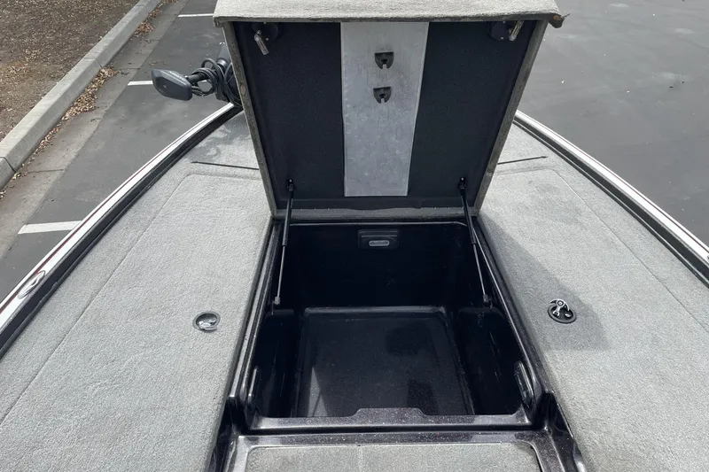 Slide: The Image of Open storage compartment on a 2013 Nitro Z-8 boat, showcasing interior space. - 9