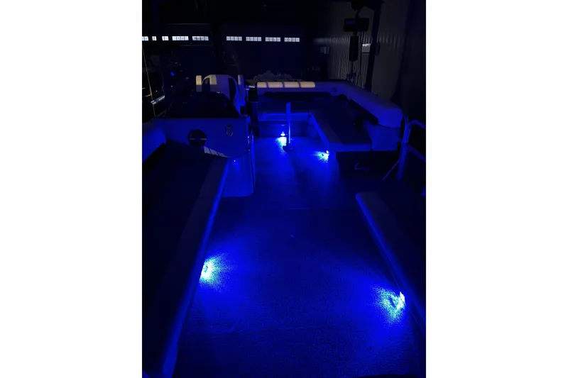Slide: The Image of 2025 Montego Bay 90HP C8520 STD Cruise Pontoon with blue LED interior lighting. - 12