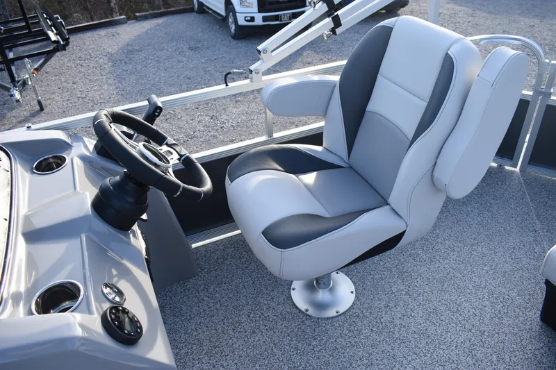Slide: The Image of Captain's chair and steering console of 2025 Montego Bay 90HP C8520 STD Cruise Pontoon. - 23