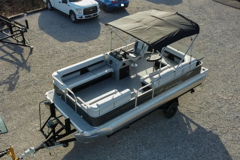 Slide: The Image of 2025 Montego Bay 90HP C8520 STD Cruise Pontoon on trailer in parking lot. - 5