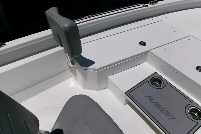 Slide: The Image of 2022 Avid 21 Fusion boat interior with seating and storage compartments. - 14