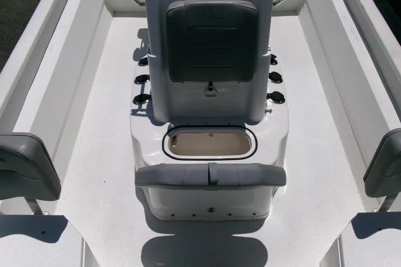 Slide: The Image of Interior view of 2022 Avid 21 Fusion boat, featuring seating and storage compartments. - 17