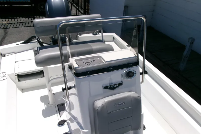 Slide: The Image of Avid 21 Fusion 2022 boat interior with seating and console, featuring modern design elements. - 18