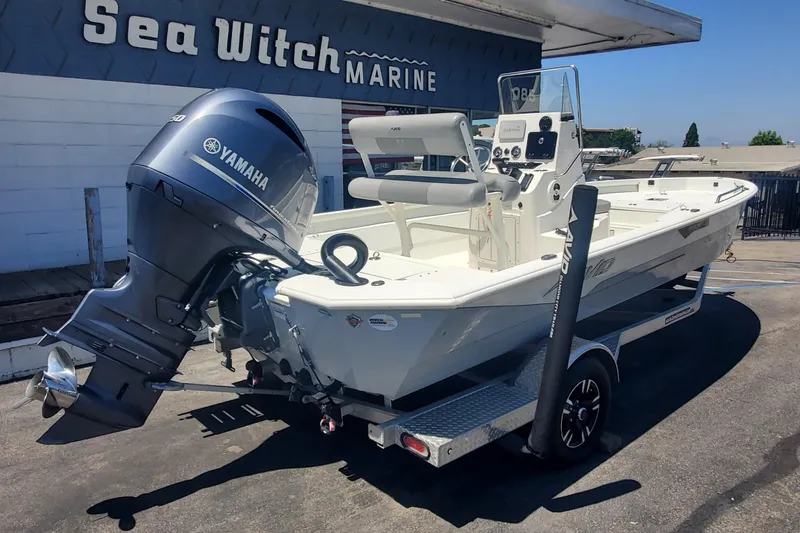 Slide: The Image of 2022 Avid 21 Fusion boat with Yamaha engine at Sea Witch Marine dealership. - 2