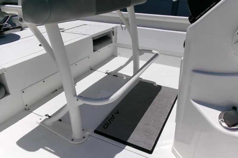 Slide: The Image of Interior of 2022 Avid 21 Fusion boat, featuring seating and deck details. - 23
