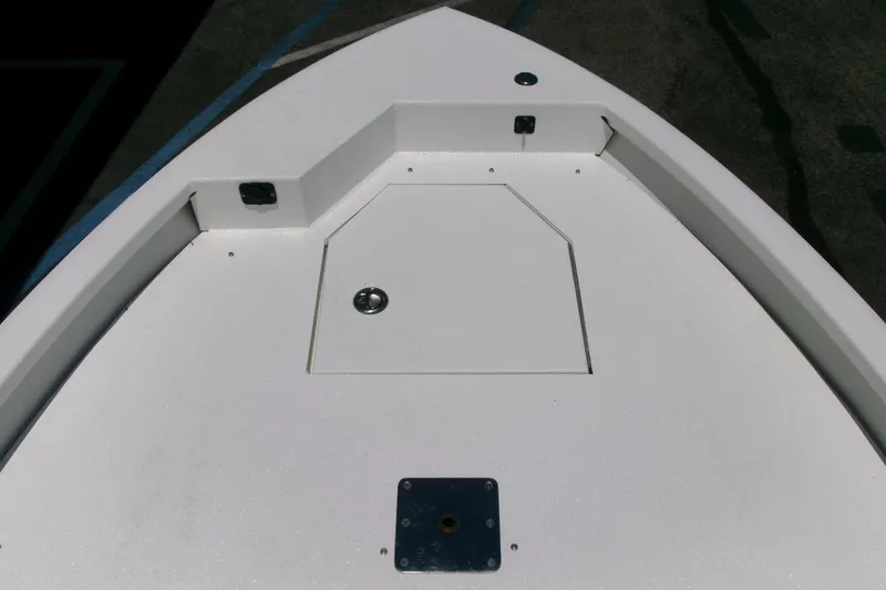 Slide: The Image of Bow deck of 2022 Avid 21 Fusion boat, featuring storage hatch and mounting plate. - 4