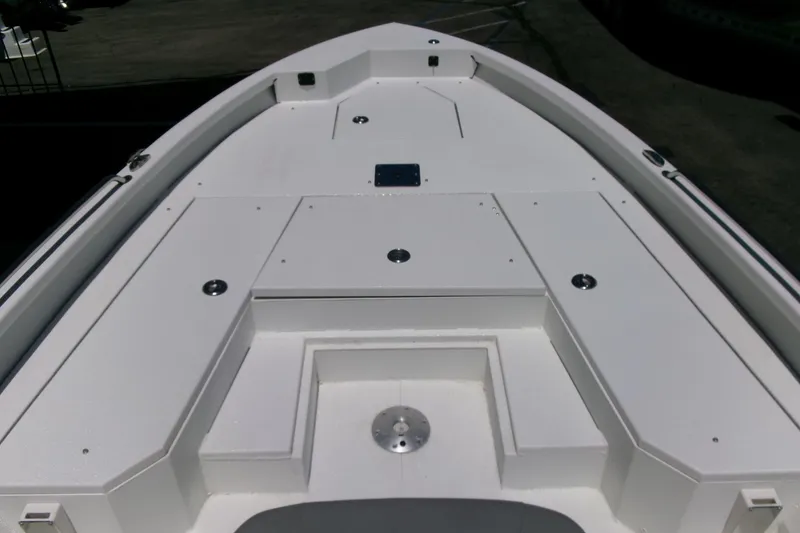 Slide: The Image of Bow view of 2022 Avid 21 Fusion boat, showcasing spacious deck layout. - 6