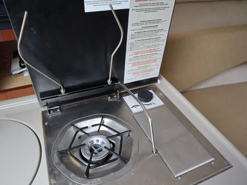 Slide: The Image of Sea Ray 240 Sundancer 2008 galley with gas stove. - 21