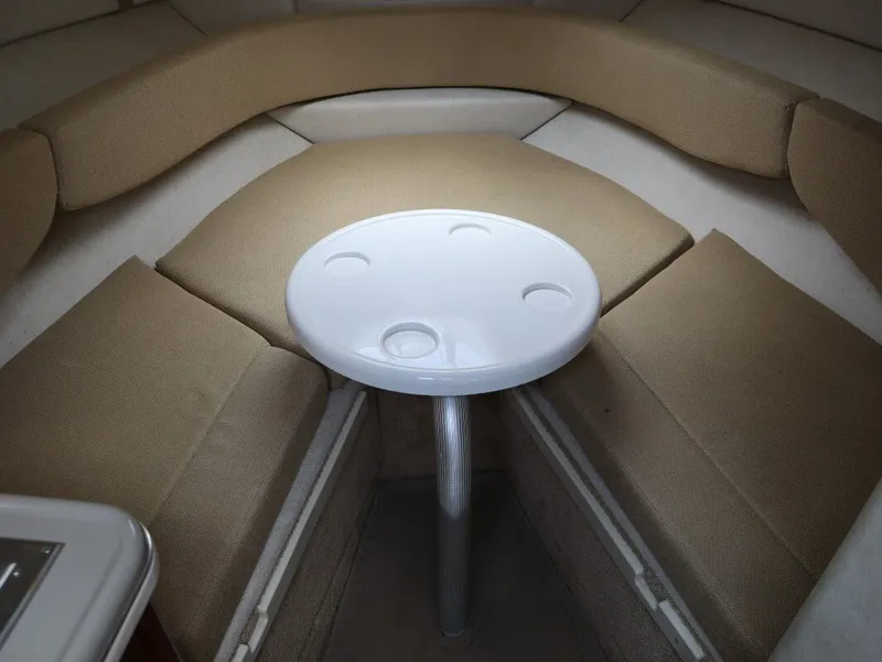 Slide: The Image of Interior of 2008 Sea Ray 240 Sundancer with table and seating area. - 22