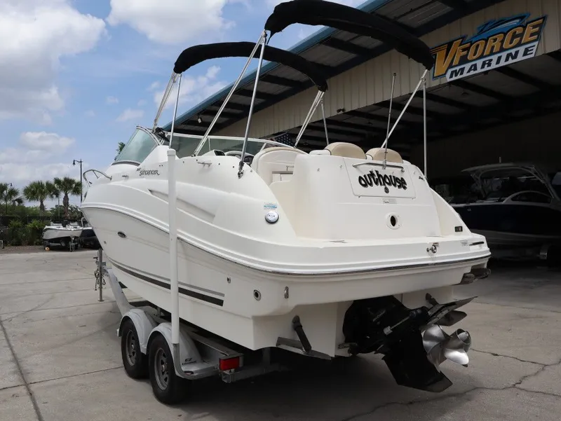 Slide: The Image of 2008 Sea Ray 240 Sundancer boat on trailer outdoors. - 5