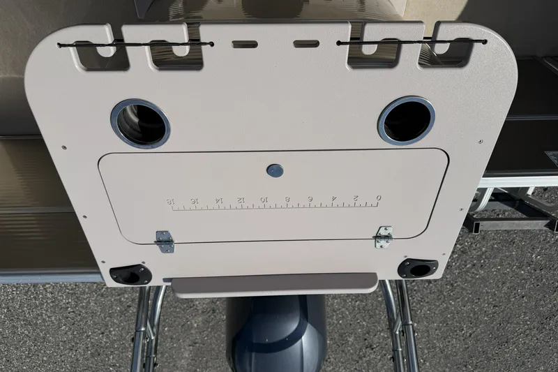 Slide: The Image of 2015 Starcraft Stardeck 216 Cruise-N-Fish boat dashboard with cup holders and ruler. - 19