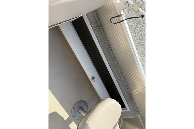 Slide: The Image of 2015 Starcraft Stardeck 216 Cruise-N-Fish boat interior storage compartment. - 22