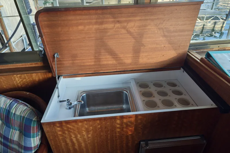 Slide: The Image of Galley area on a 1976 Hatteras 38 Double Cabin yacht. - 12