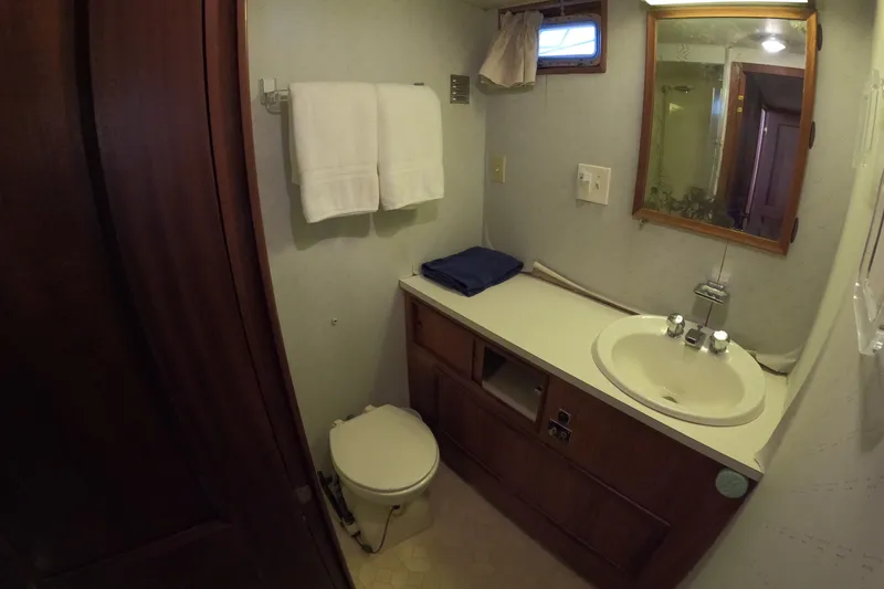 Slide: The Image of Bathroom of the 1976 Hatteras 38 Double Cabin yacht. - 25