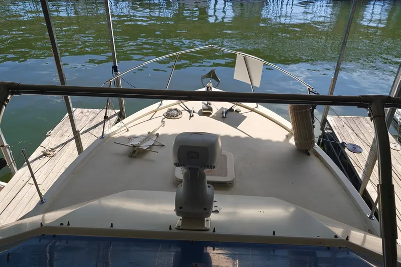 Slide: The Image of 1976 Hatteras 38 Double Cabin at dock, view of foredeck. - 8