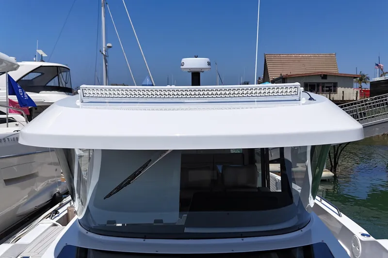 Slide: The Image of 2026 Cruisers Yachts 38 VTR docked, showcasing sleek design and modern features. - 30