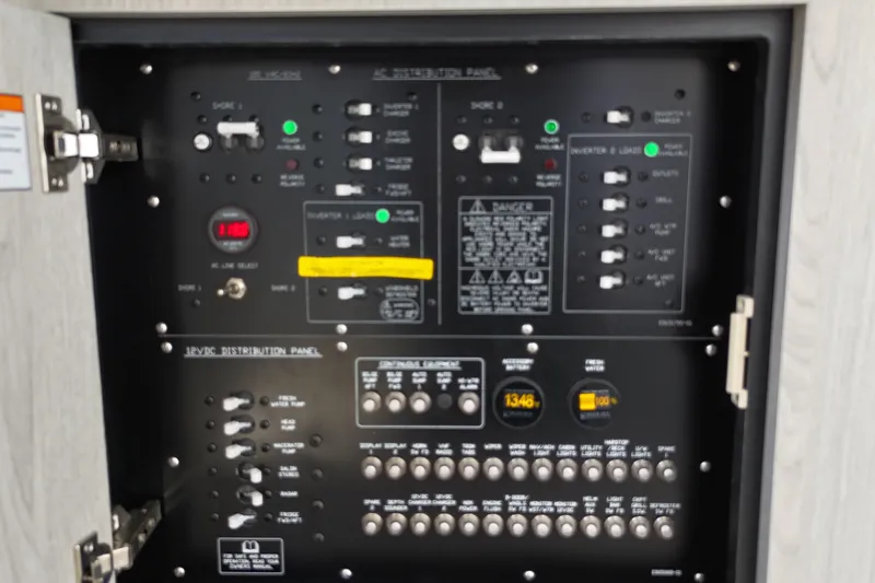 Slide: The Image of Electrical control panel on a 2026 Cruisers Yachts 38 VTR boat. - 32