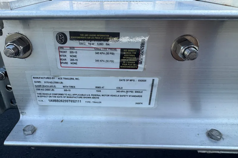 Slide: The Image of Label on a 2018 Hurricane SunDeck 2400 OB trailer, detailing tire and load specifications. - 26