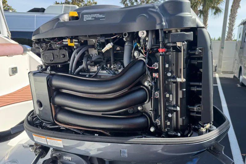 Slide: The Image of 2018 Hurricane SunDeck 2400 OB outboard engine, detailed view of internal components. - 6