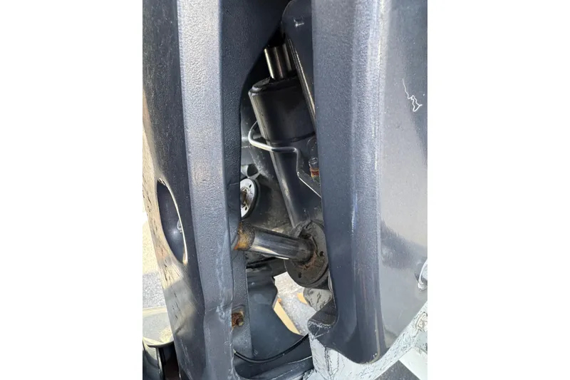 Slide: The Image of Close-up of 2018 Hurricane SunDeck 2400 OB boat engine components. - 9