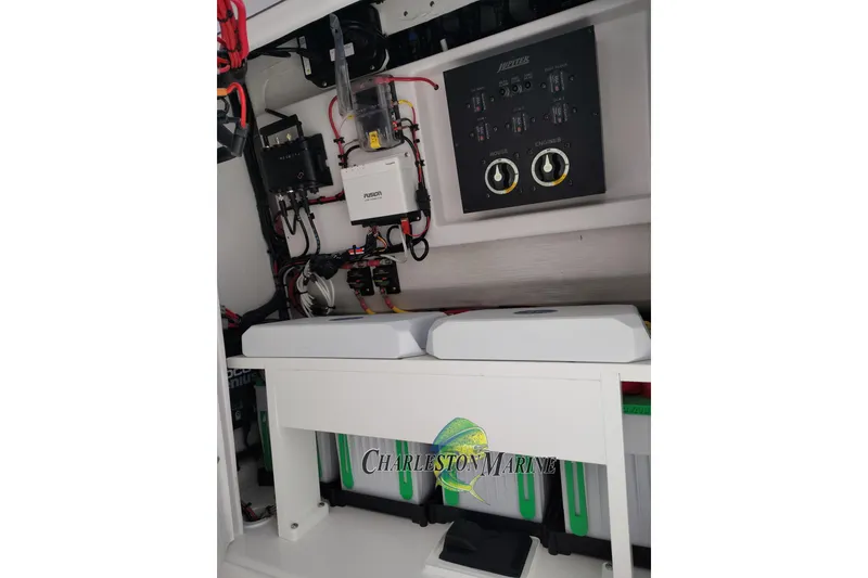 Slide: The Image of Electrical panel and components inside a 2026 Jupiter 30 boat. - 30