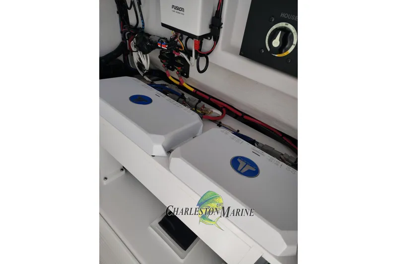 Slide: The Image of Electrical system of a 2026 Jupiter 30 boat, featuring wiring and control panels. - 32