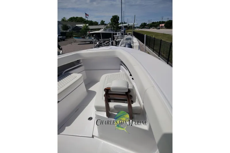 Slide: The Image of 2026 Jupiter 30 boat deck with seating, displayed at Charleston Marine. - 8