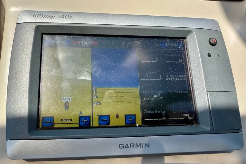 Slide: The Image of Garmin GPSmap 740s on 2002 Cruisers Yachts 2870 Express, displaying navigation data. - 13
