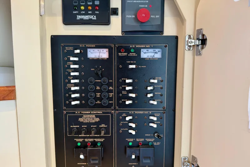 Slide: The Image of Electrical control panel on a 2002 Cruisers Yachts 2870 Express boat. - 25