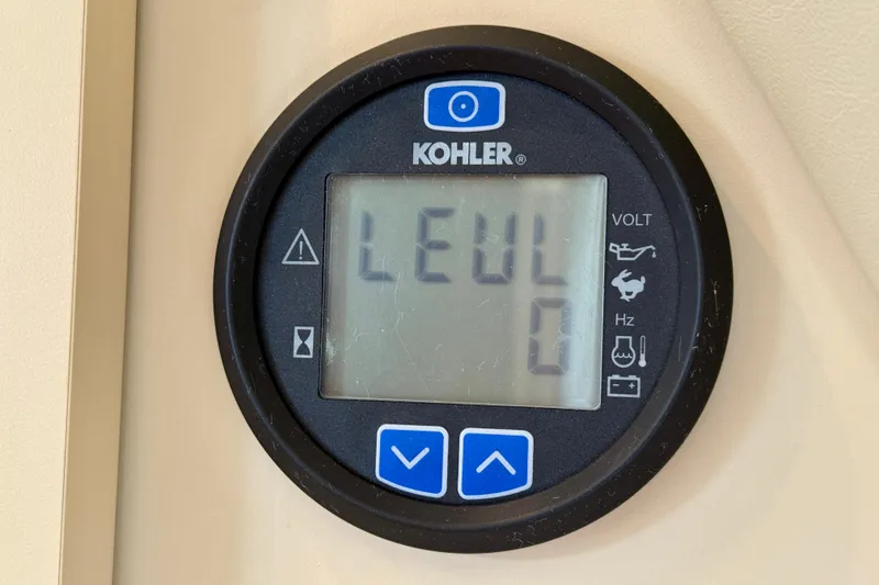 Slide: The Image of Kohler control panel on 2002 Cruisers Yachts 2870 Express, displaying "LEUL 0". - 26