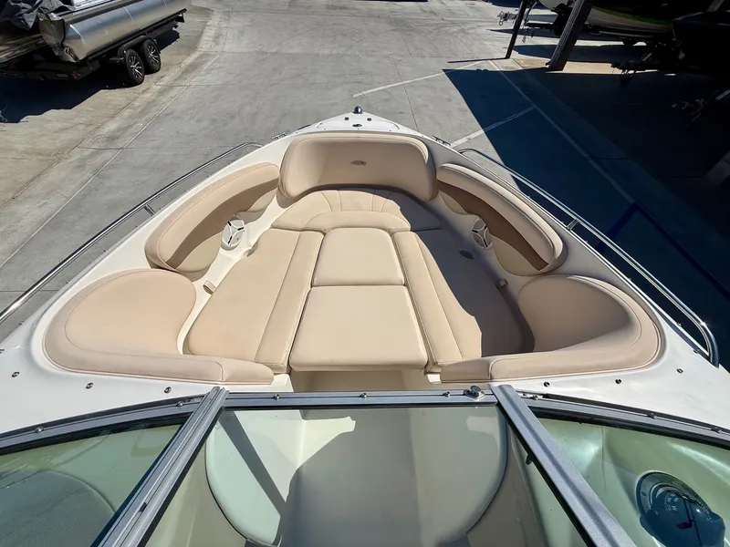 Slide: The Image of 2006 Chaparral SSi 210 boat with beige upholstery. - 12