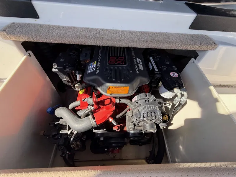 Slide: The Image of Engine compartment of a 2006 Chaparral SSi 210 boat with Volvo Penta engine. - 16